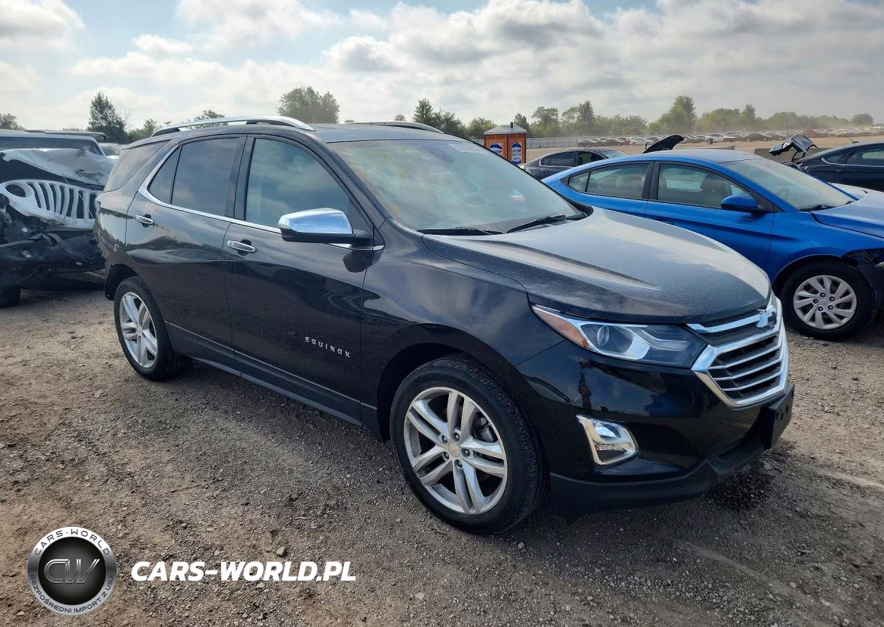 2018 Chevrolet Equinox Premier VIN:2GNAXWEX0J6138629 - 4