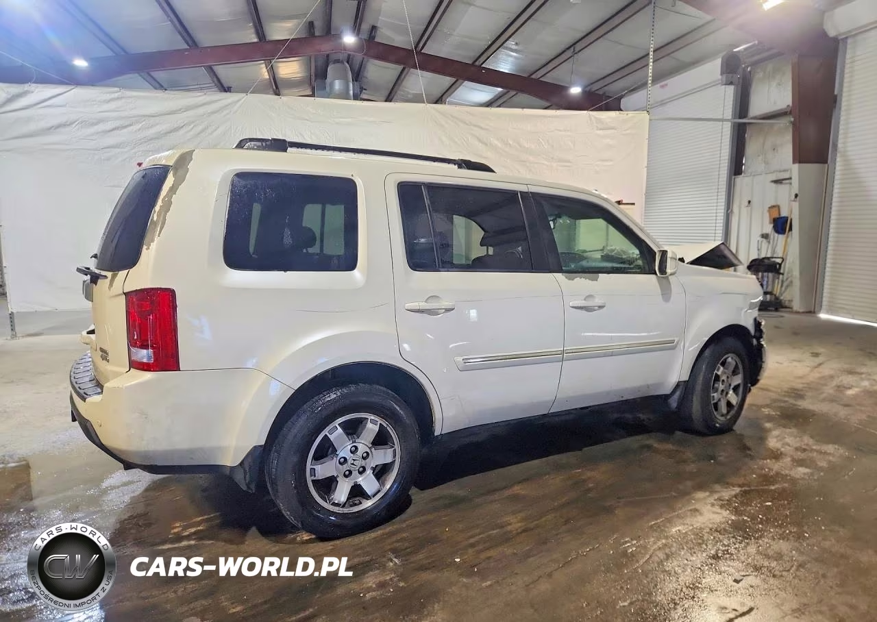 2011 Honda Pilot Touring VIN:5FNYF4H91BB099976 - 3
