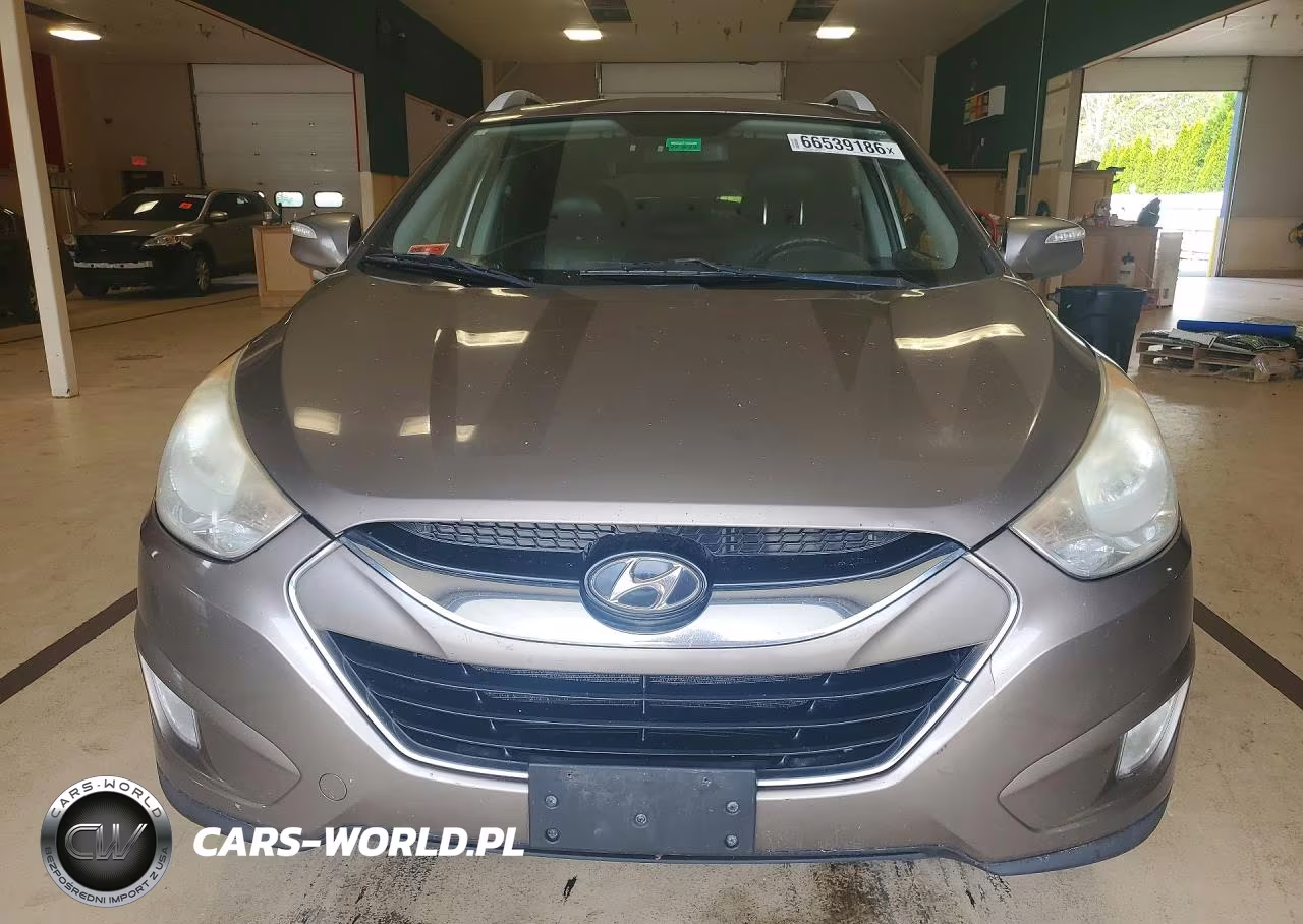 2010 Hyundai Tucson Limited VIN:KM8JUCAC1AU047207 - 5