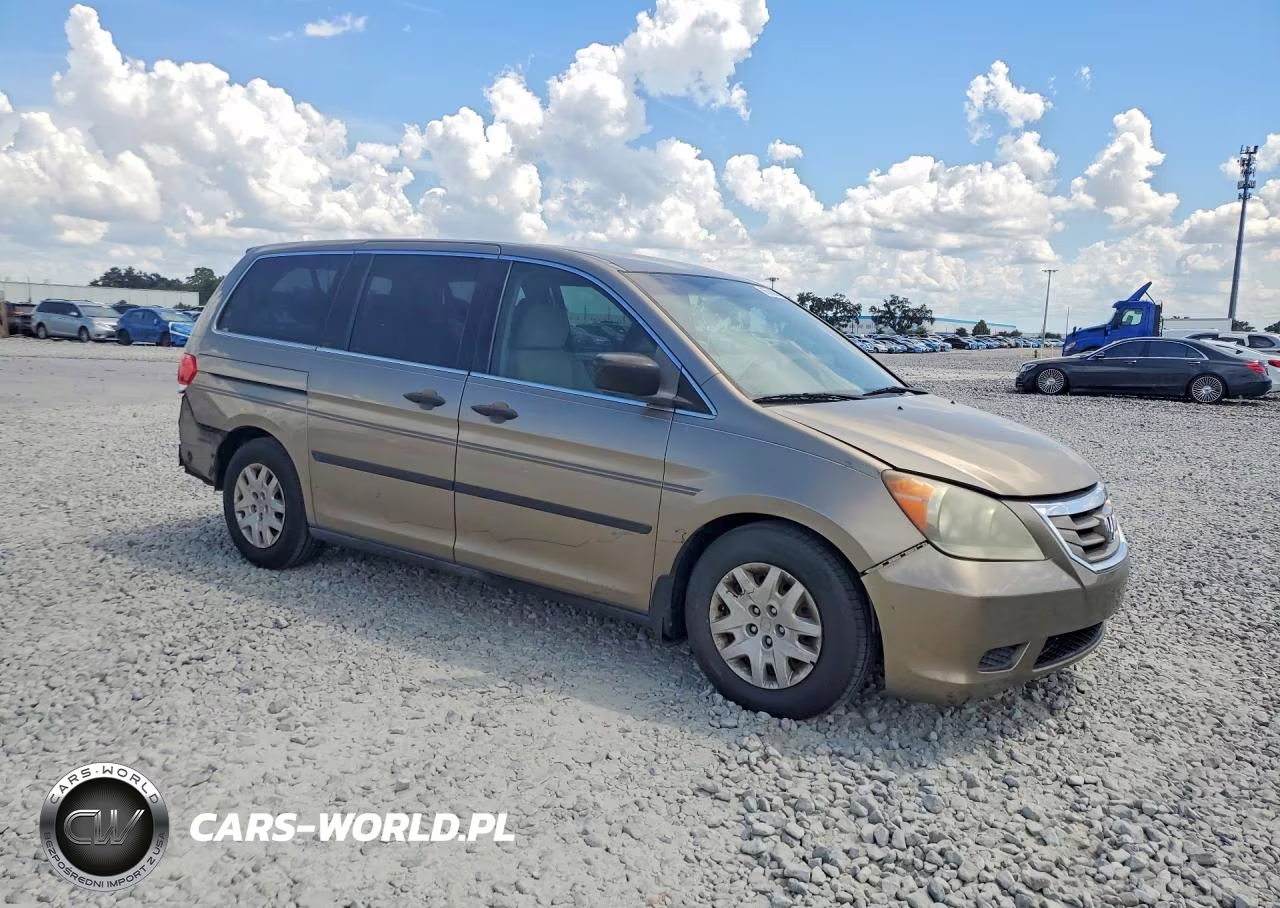 2010 Honda Odyssey Lx VIN:5FNRL3H21AB051399 - 4