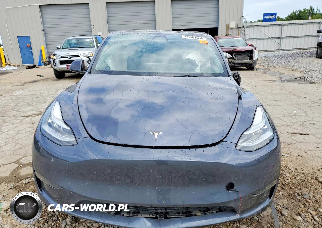 2023 Tesla Model Y VIN:7SAYGDEE7PA057642 - 5