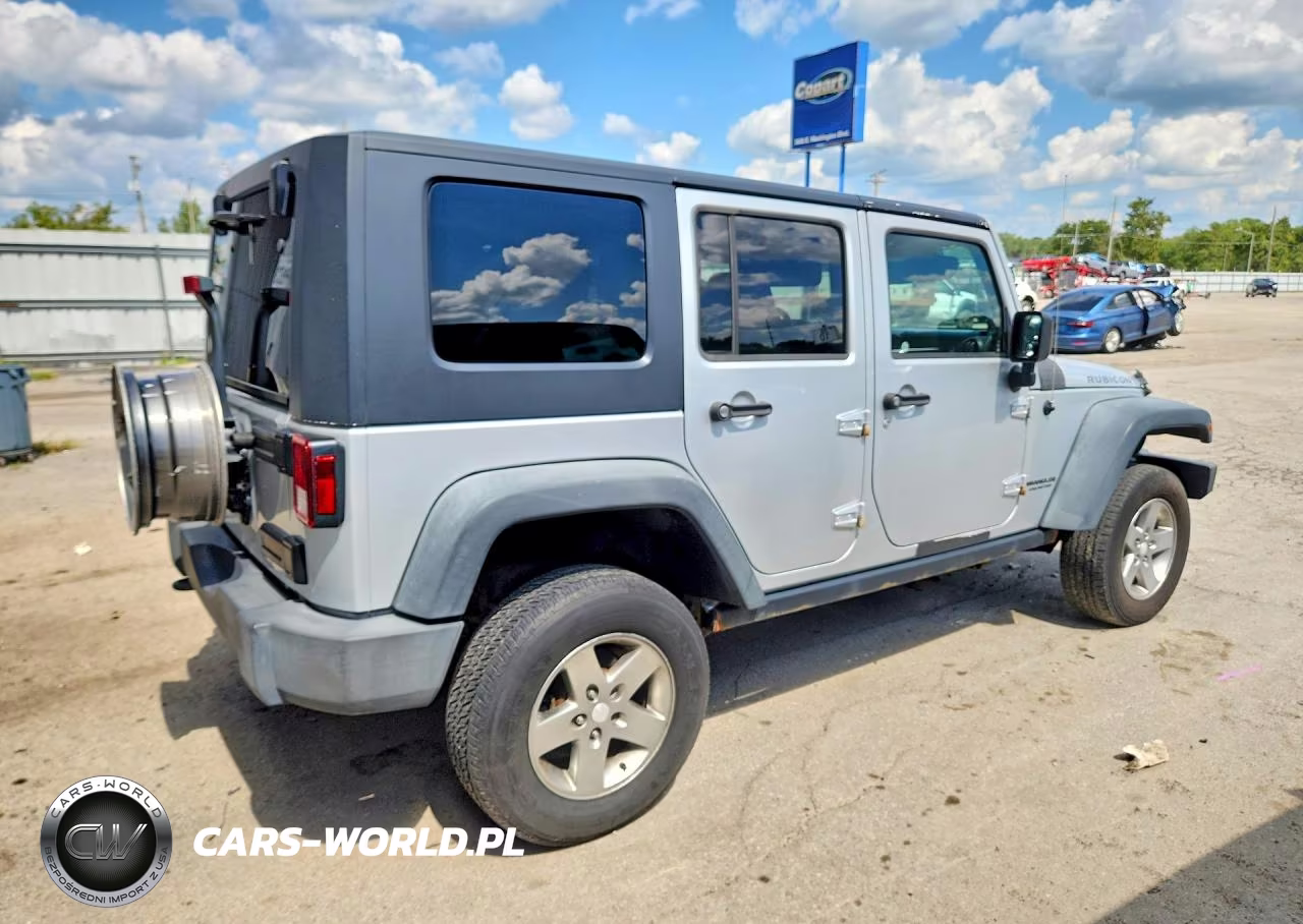 2010 Jeep Wrangler Unlimited Rubicon VIN:1J4BA6H18AL133962 - 3