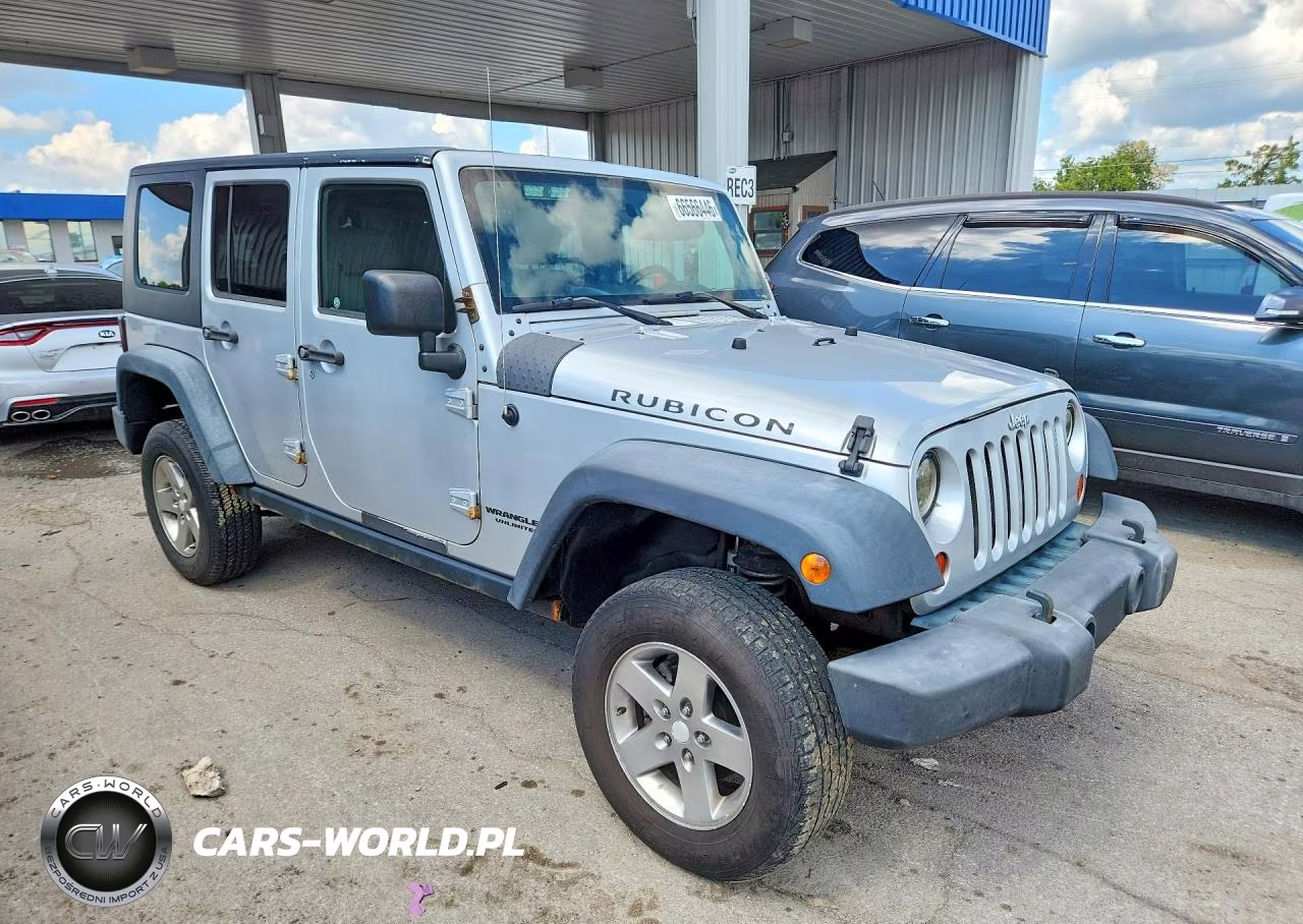 2010 Jeep Wrangler Unlimited Rubicon VIN:1J4BA6H18AL133962 - 4
