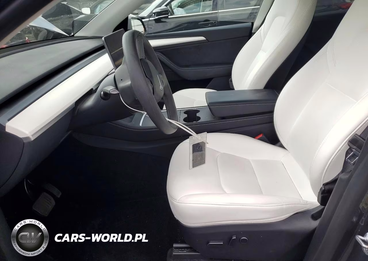 2023 Tesla Model Y VIN:7SAYGDEE1PA174584 - 7