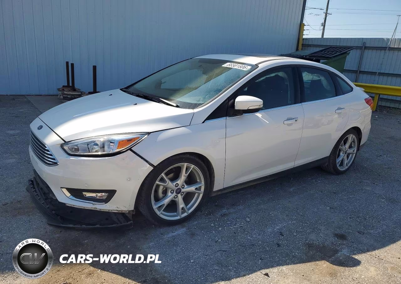 2016 Ford Focus Titanium VIN:1FADP3J25GL289034 - 1