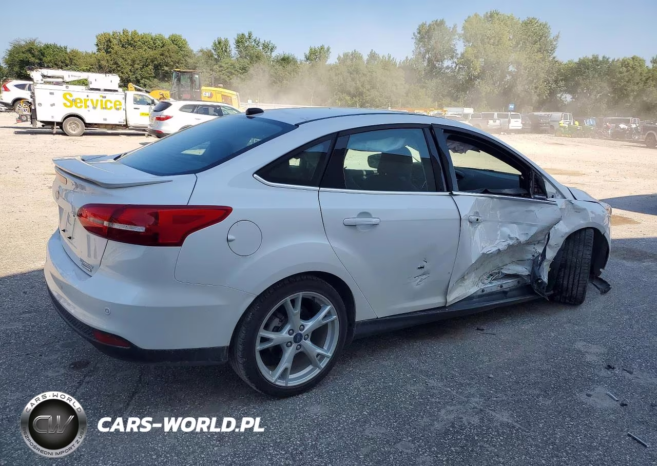 2016 Ford Focus Titanium VIN:1FADP3J25GL289034 - 3