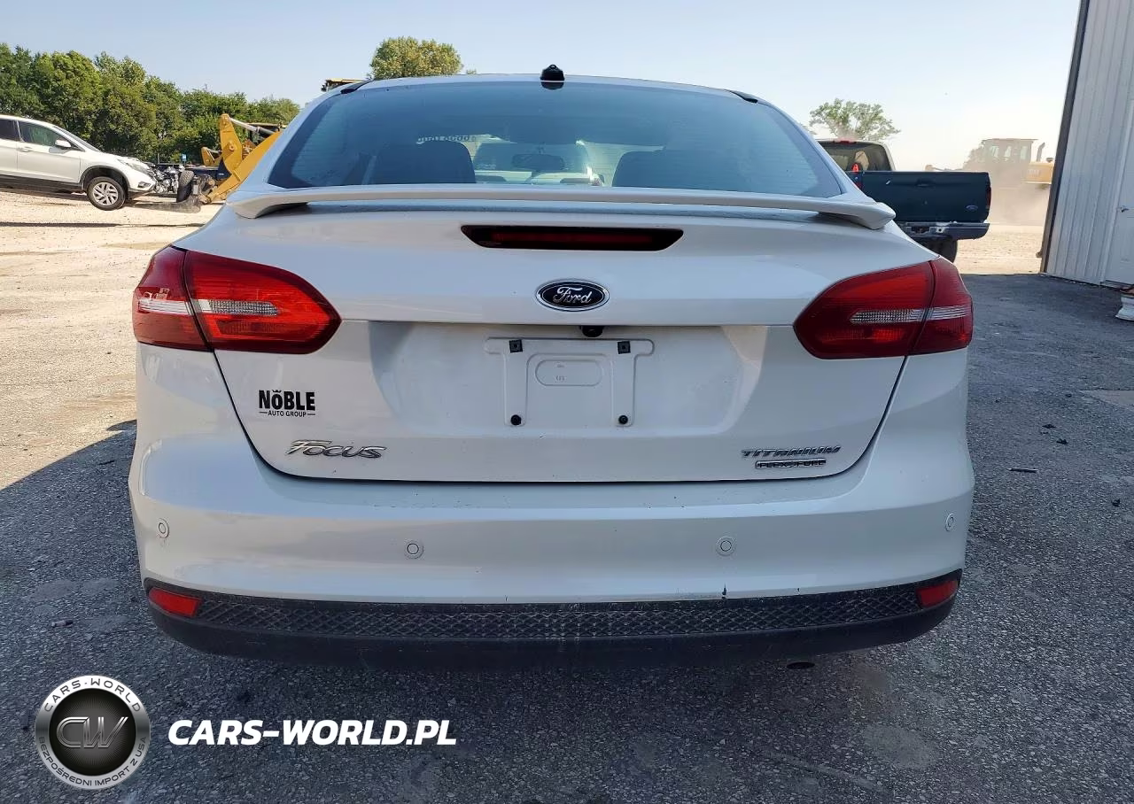 2016 Ford Focus Titanium VIN:1FADP3J25GL289034 - 6