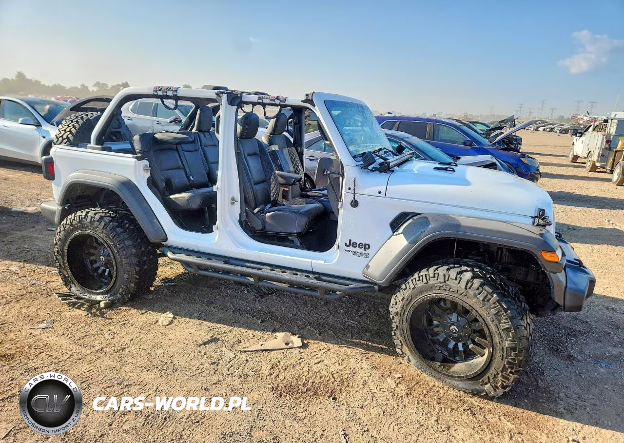 2020 Jeep Wrangler Unlimited Sport VIN:1C4HJXDG4LW139999 - 4