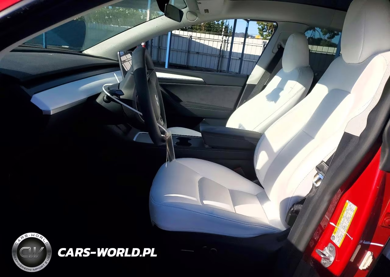 2023 Tesla Model Y VIN:7SAYGDEE9PF806587 - 7
