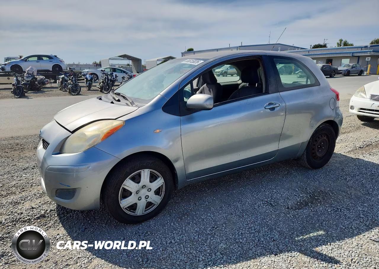 2009 Toyota Yaris Base VIN:JTDJT903495233275 - 1