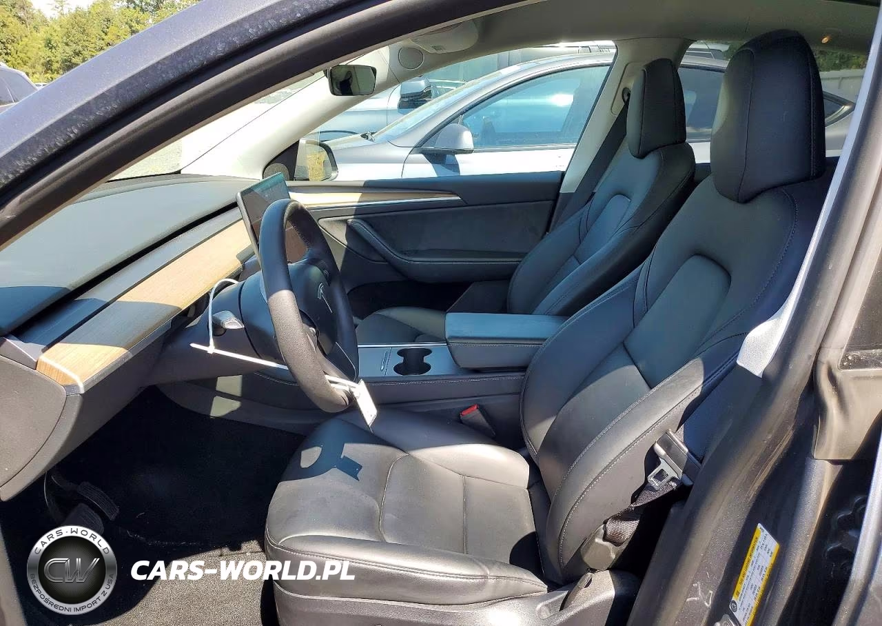 2023 Tesla Model Y VIN:7SAYGDEE4PA043231 - 7