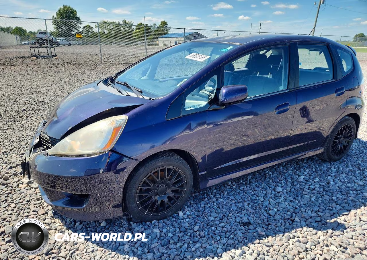 2009 Honda Fit Sport VIN:JHMGE88479S011180 - 1
