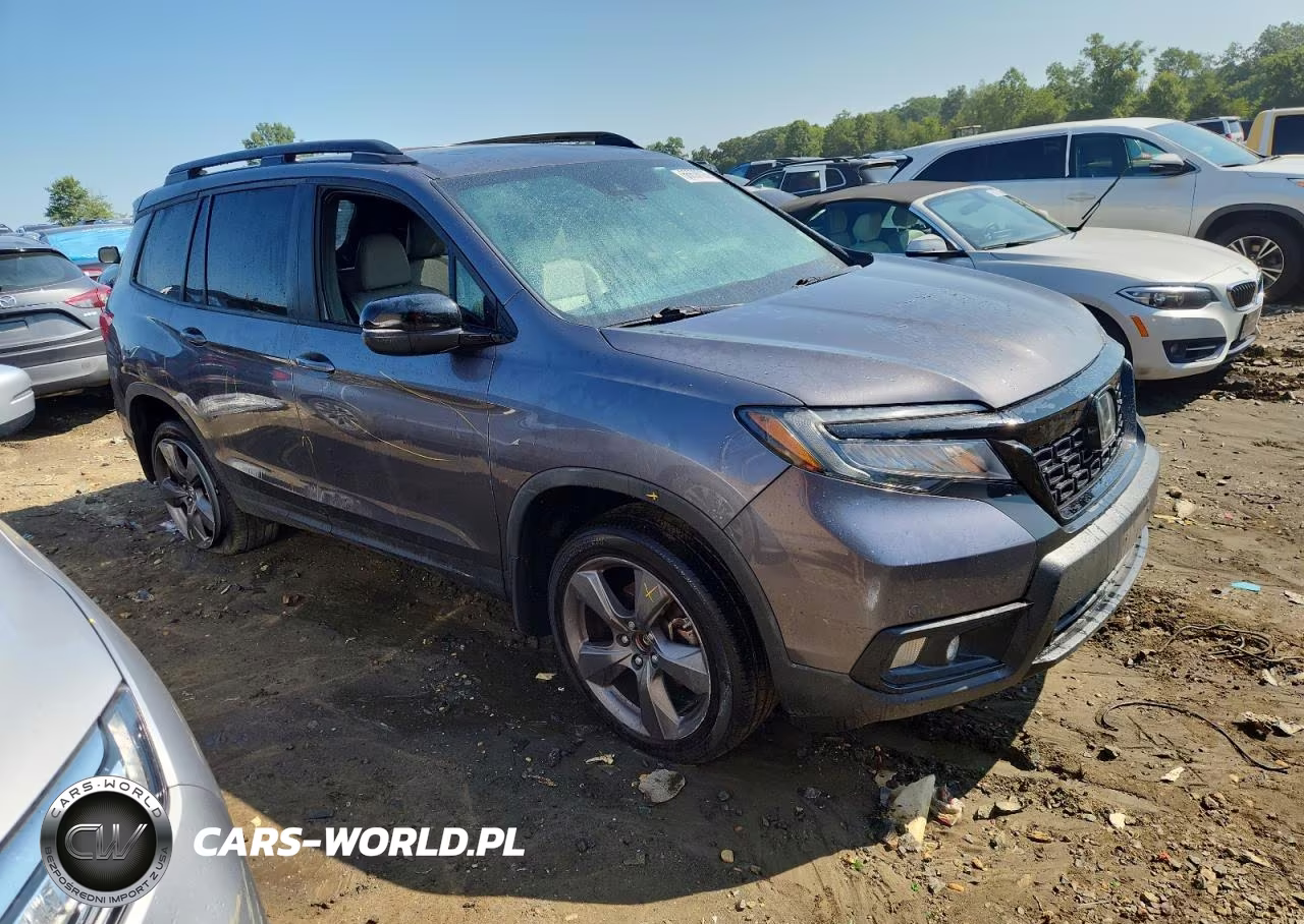 2021 Honda Passport Touring VIN:5FNYF8H96MB021641 - 4