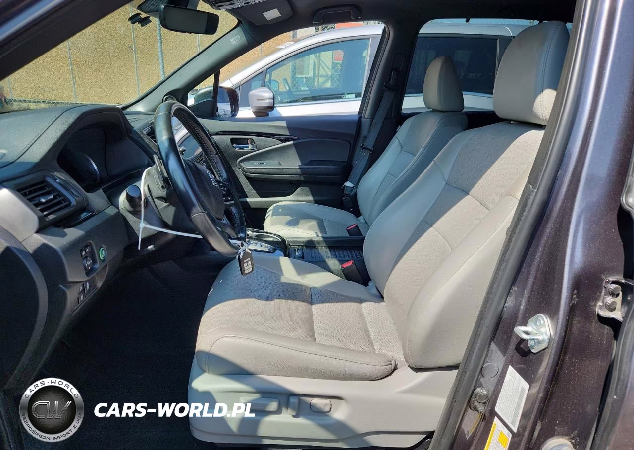 2021 Honda Passport Touring VIN:5FNYF8H96MB021641 - 7