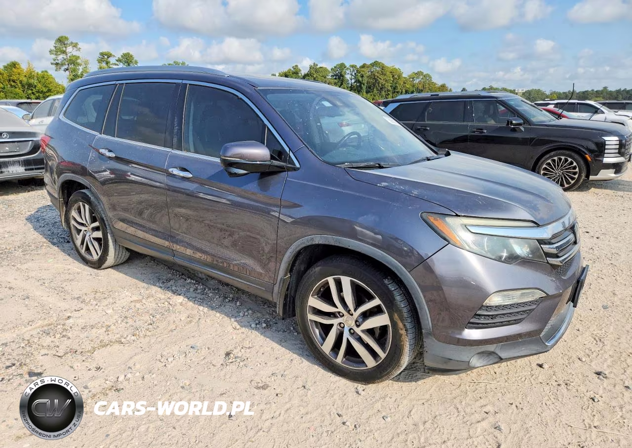 2016 Honda Pilot Touring VIN:5FNYF5H92GB040741 - 4