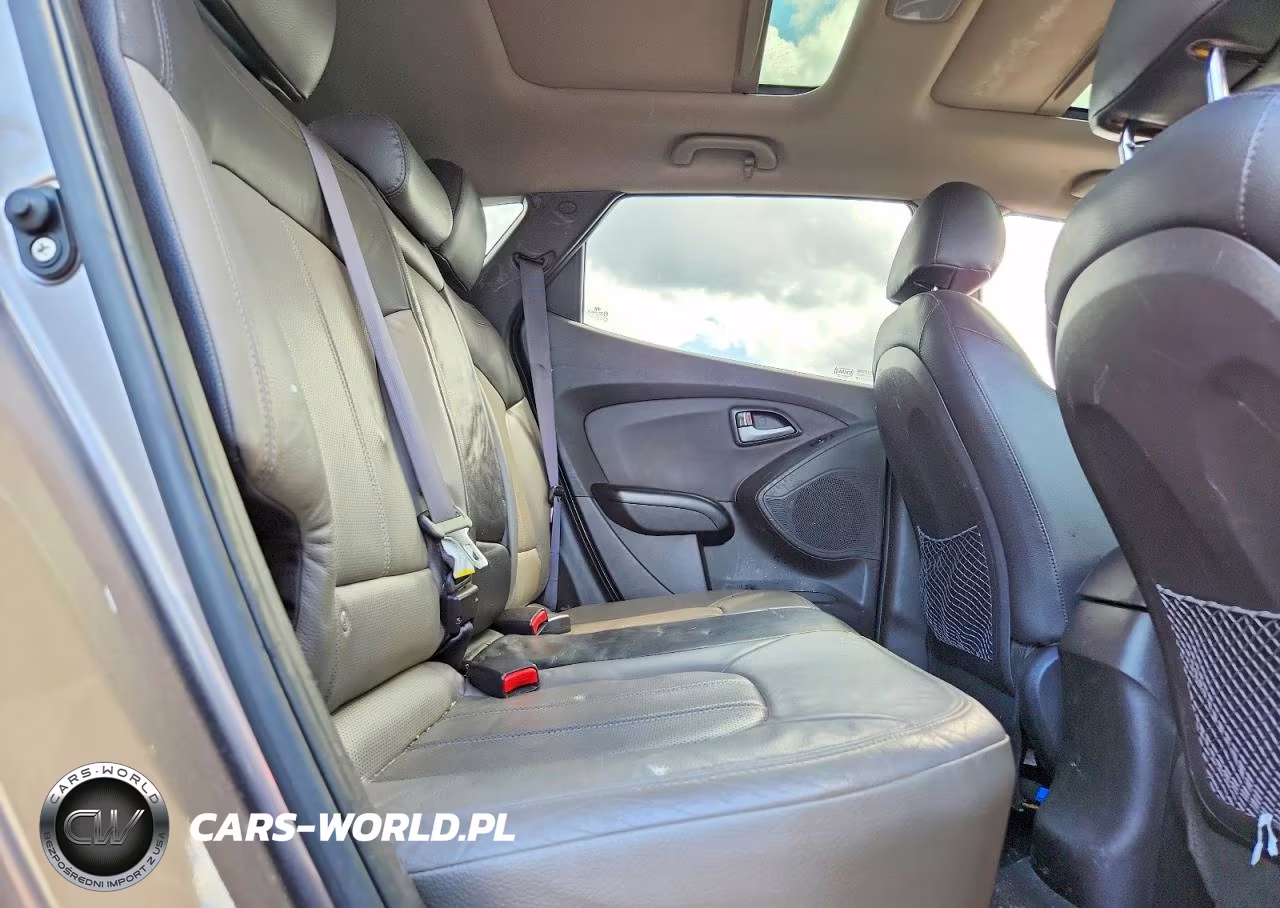 2012 Hyundai Tucson Limited VIN:KM8JUCAC8CU375047 - 11