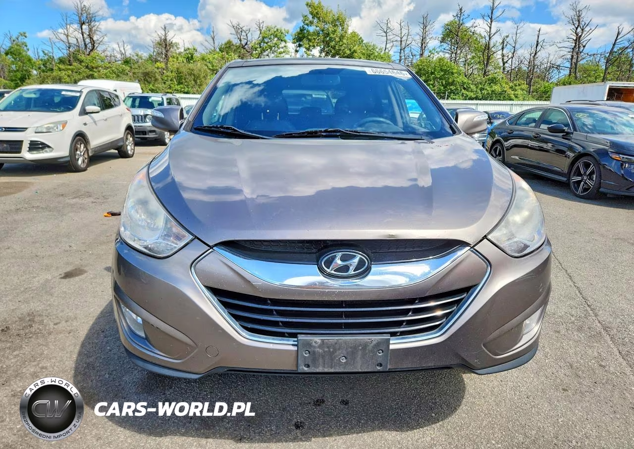 2012 Hyundai Tucson Limited VIN:KM8JUCAC8CU375047 - 5