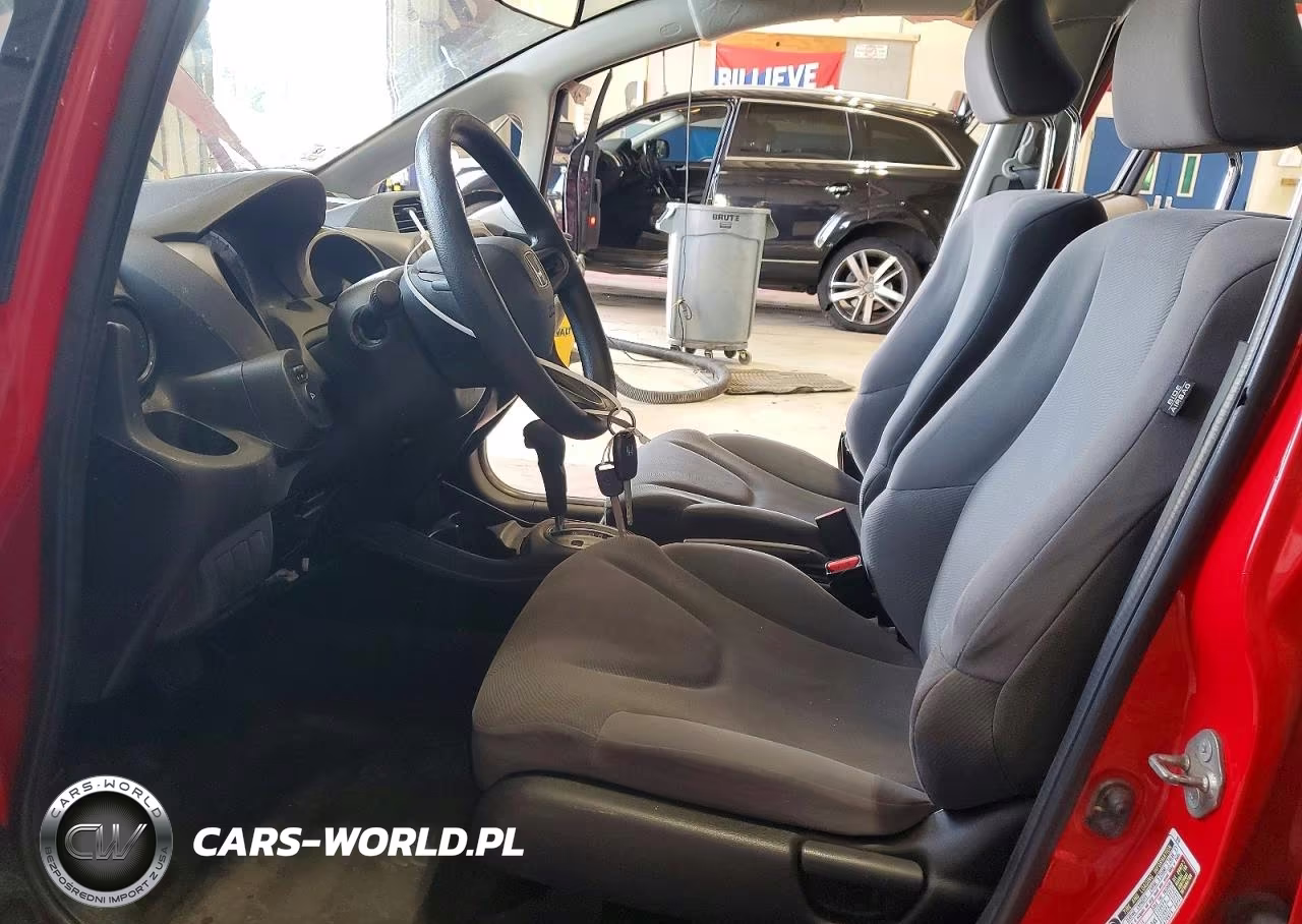 2009 Honda Fit VIN:JHMGE88239S058088 - 7