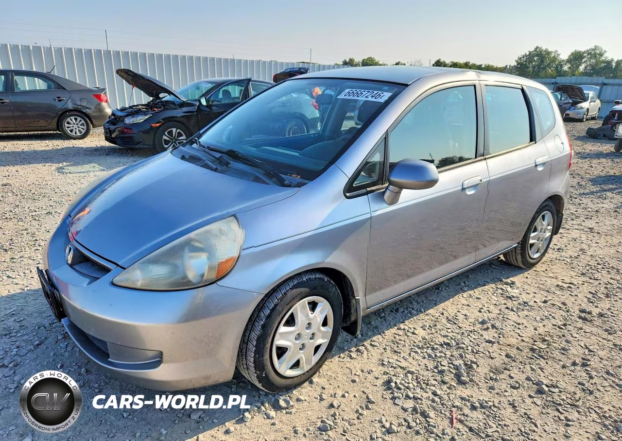 2007 Honda Fit VIN:JHMGD38447S050697 - 1