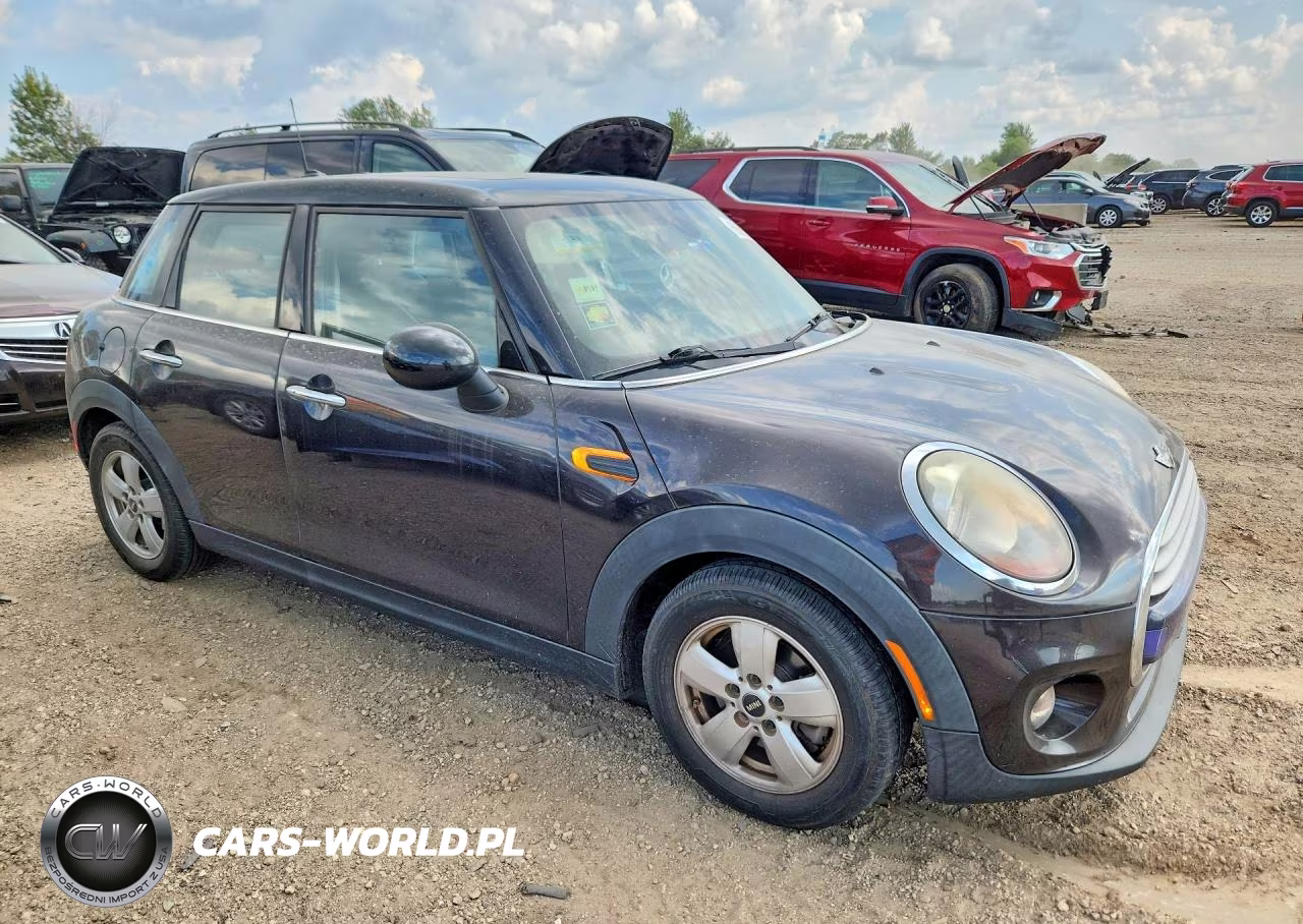 2015 Mini Cooper VIN:WMWXS5C57FT833554 - 4
