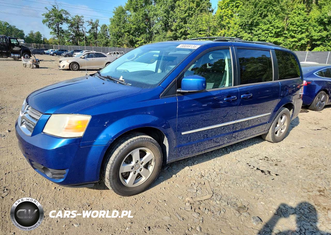 2010 Dodge Grand Caravan Sxt VIN:2D4RN5D13AR264025 - 1