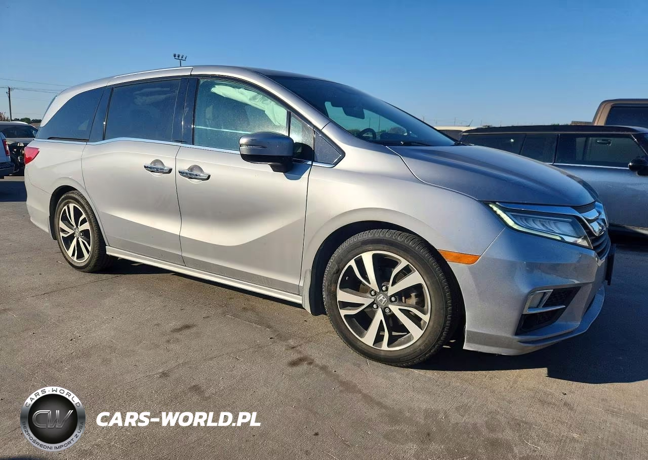 2018 Honda Odyssey Elite VIN:5FNRL6H90JB034138 - 4