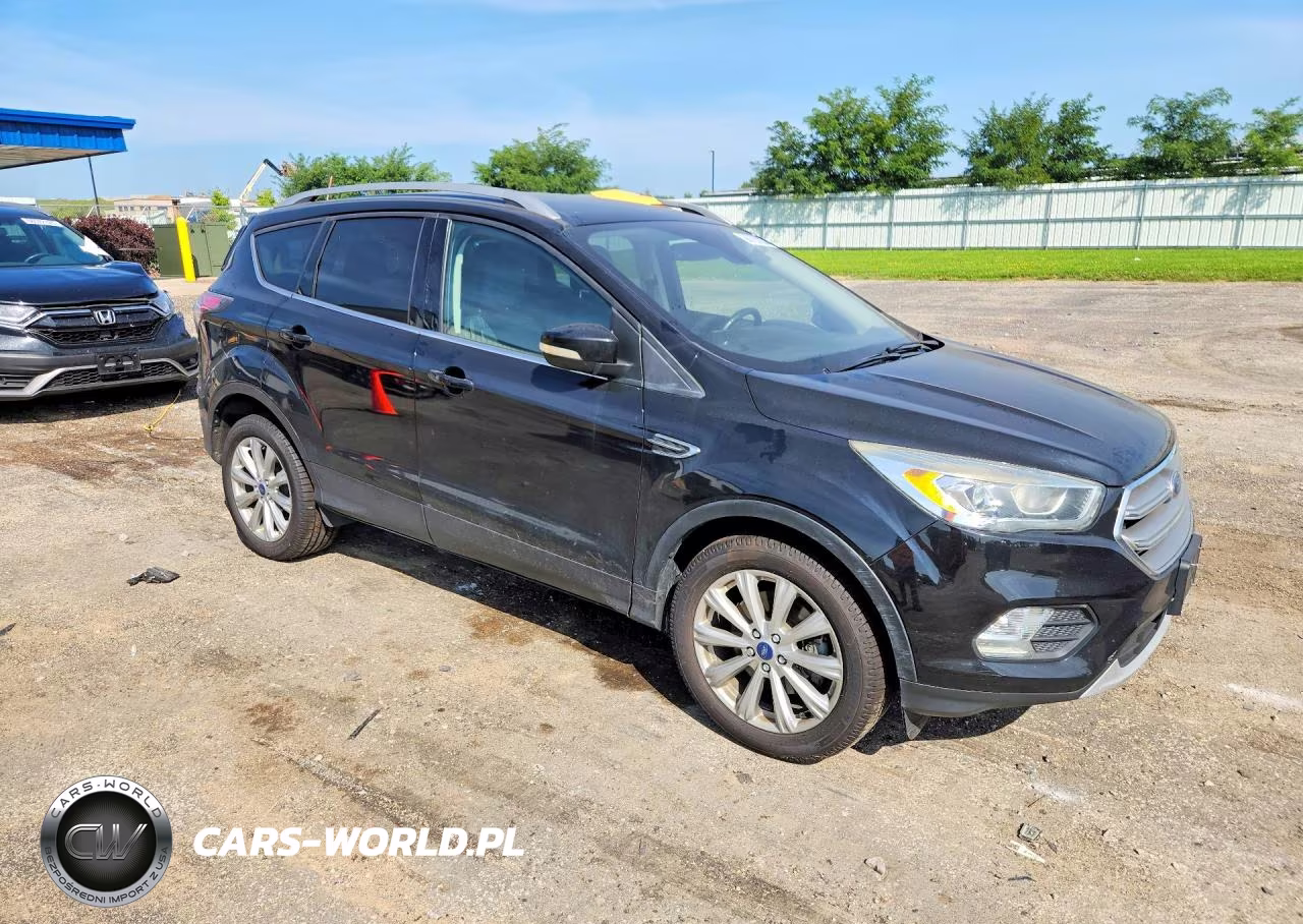 2017 Ford Escape Titanium VIN:1FMCU9JD5HUB34266 - 4