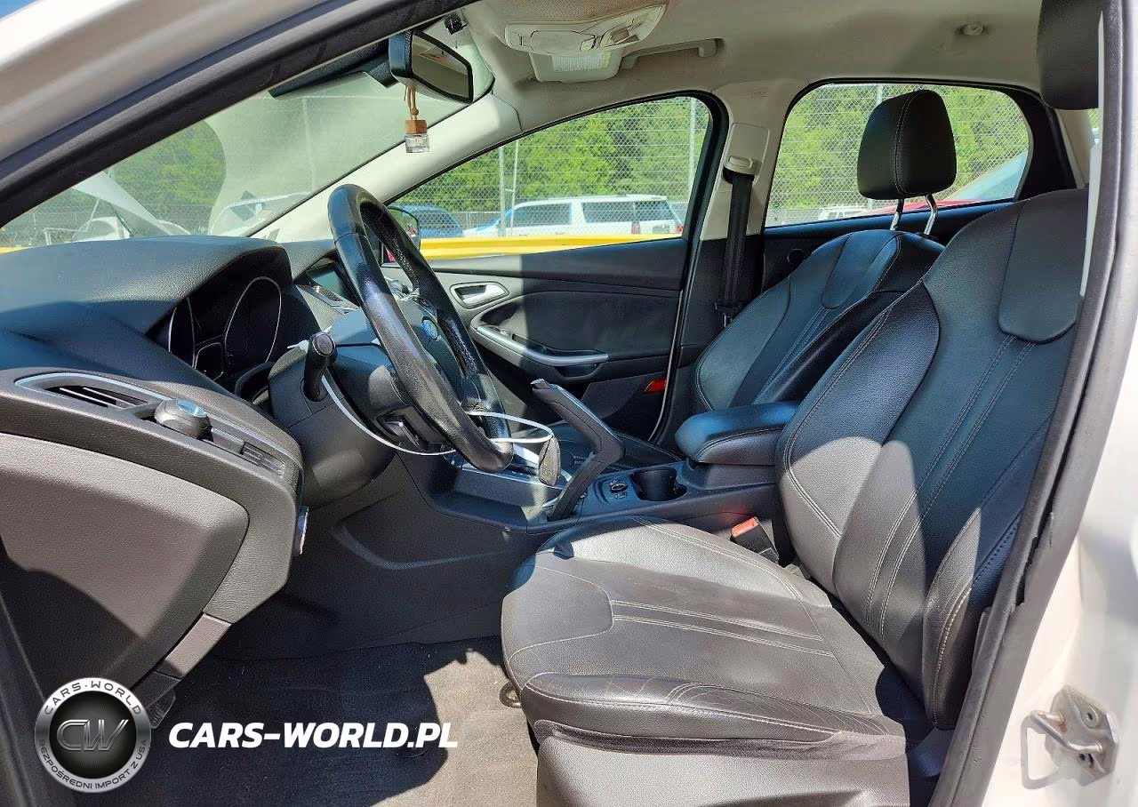 2012 Ford Focus Titanium VIN:1FAHP3N23CL289300 - 7