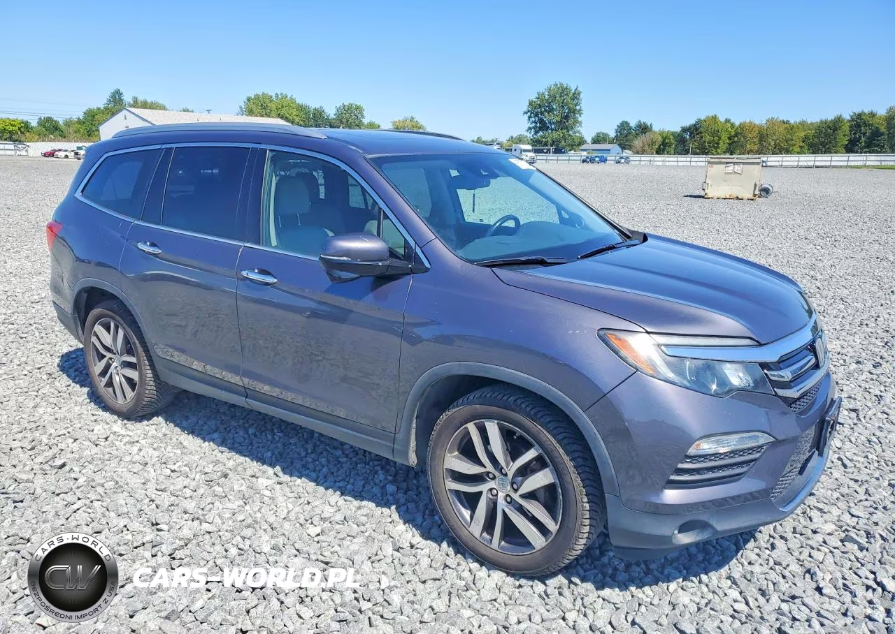 2017 Honda Pilot Touring VIN:5FNYF6H95HB018630 - 4