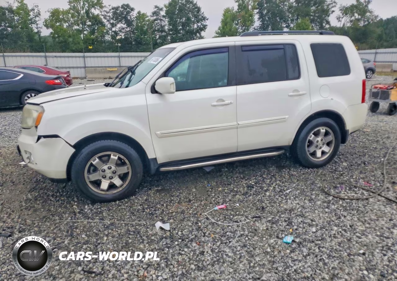 2011 Honda Pilot Touring VIN:5FNYF3H97BB052249 - 1