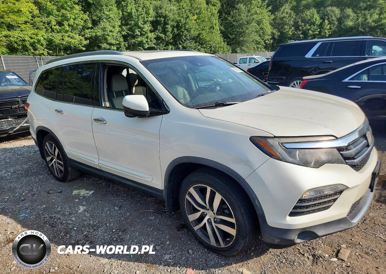 2016 Honda Pilot Touring VIN:5FNYF5H95GB016126 - 4