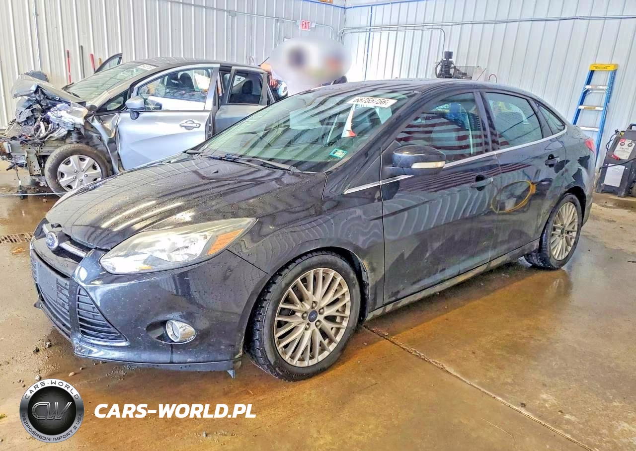 2014 Ford Focus Titanium VIN:1FADP3J23EL275789 - 1