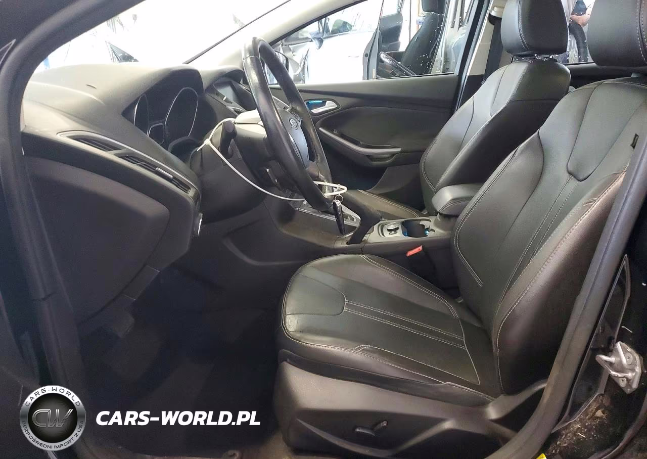 2014 Ford Focus Titanium VIN:1FADP3J23EL275789 - 7