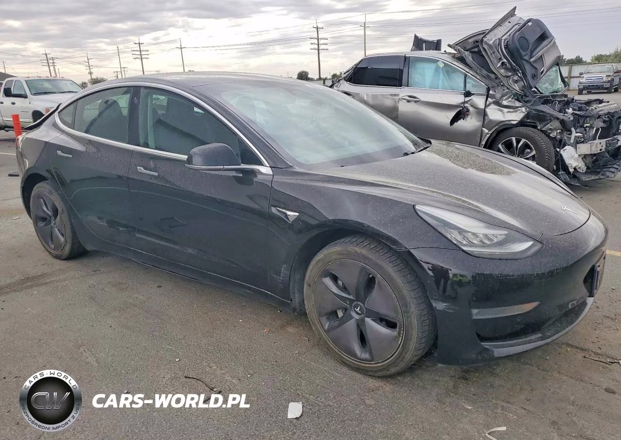 2018 Tesla Model 3 VIN:5YJ3E1EB7JF118709 - 4