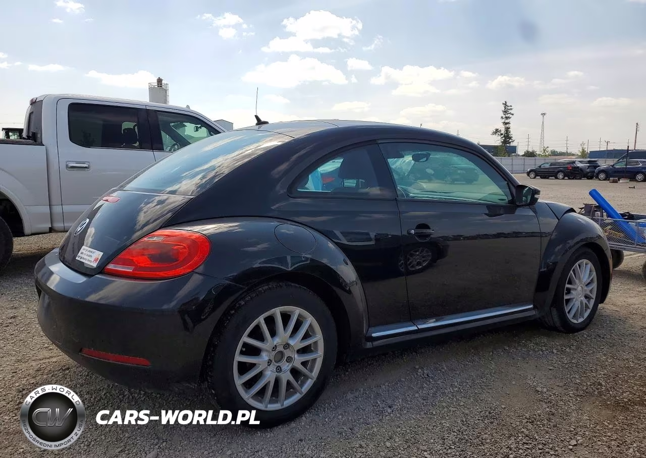 2012 Volkswagen Beetle VIN:3VWJX7AT5CM659689 - 3