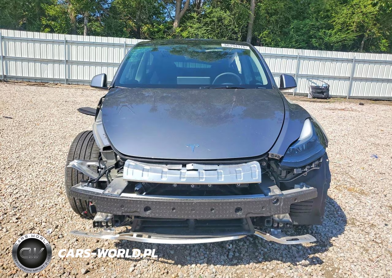 2024 Tesla Model Y VIN:7SAYGDEF6RA321140 - 5