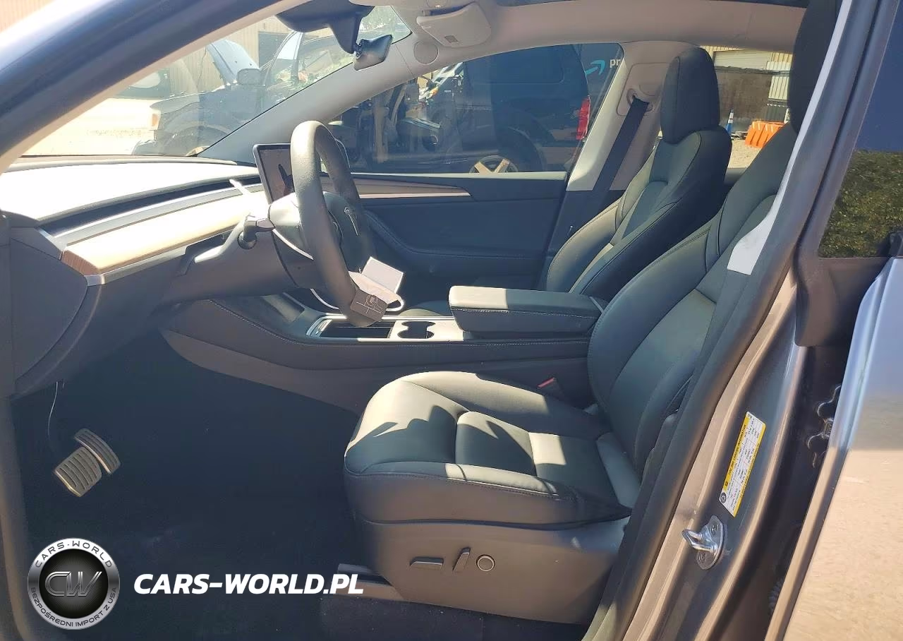 2024 Tesla Model Y VIN:7SAYGDEF6RA321140 - 7