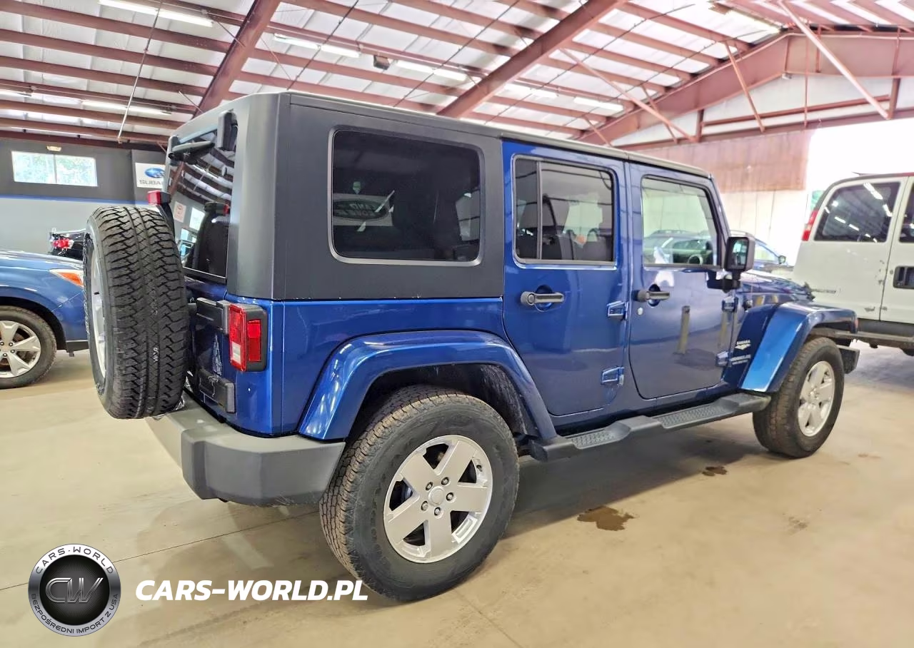 2010 Jeep Wrangler Unlimited Sahara VIN:1J4BA5H13AL162974 - 3