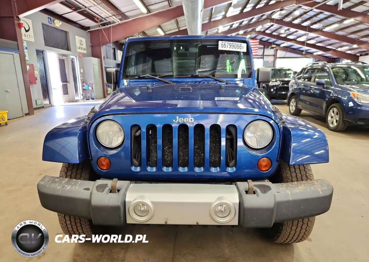 2010 Jeep Wrangler Unlimited Sahara VIN:1J4BA5H13AL162974 - 5