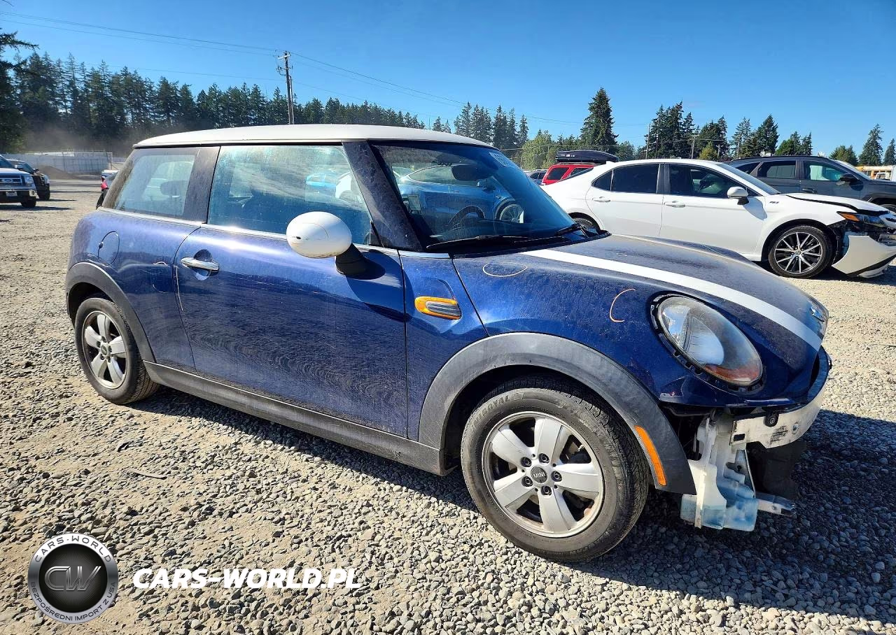 2015 Mini Cooper VIN:WMWXM5C51FT940173 - 4