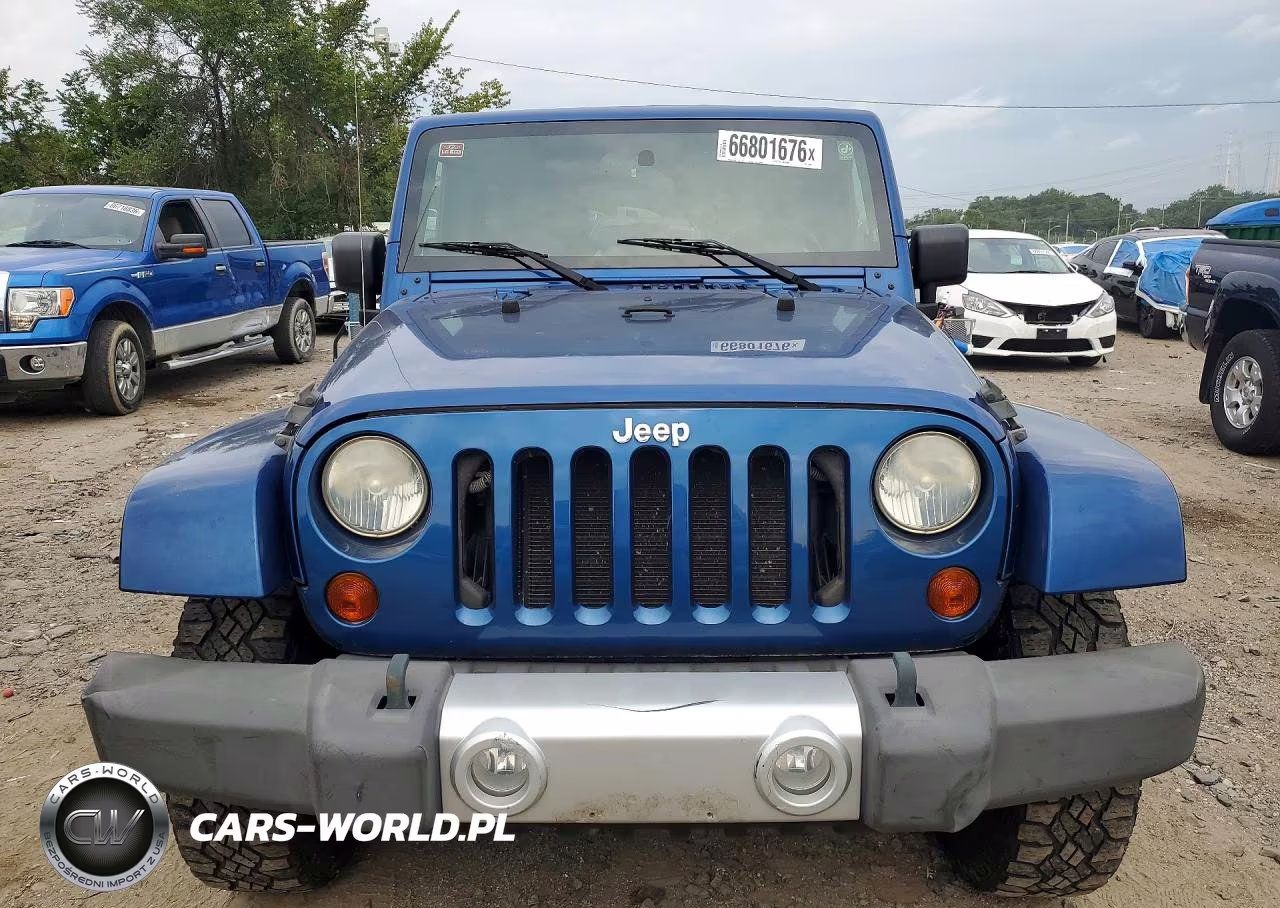 2010 Jeep Wrangler Unlimited Sahara VIN:1J4BA5H17AL179941 - 5