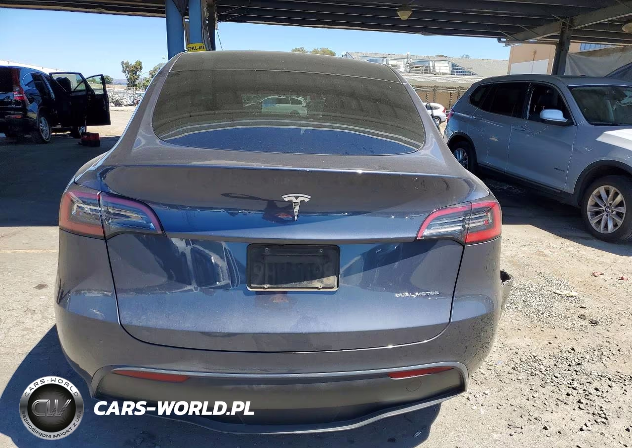2023 Tesla Model Y VIN:7SAYGAEE2PF862675 - 6