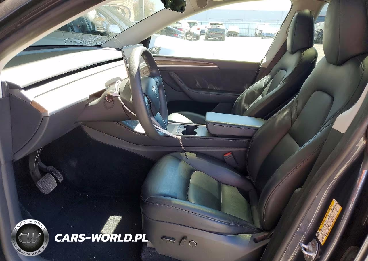 2023 Tesla Model Y VIN:7SAYGAEE2PF862675 - 7