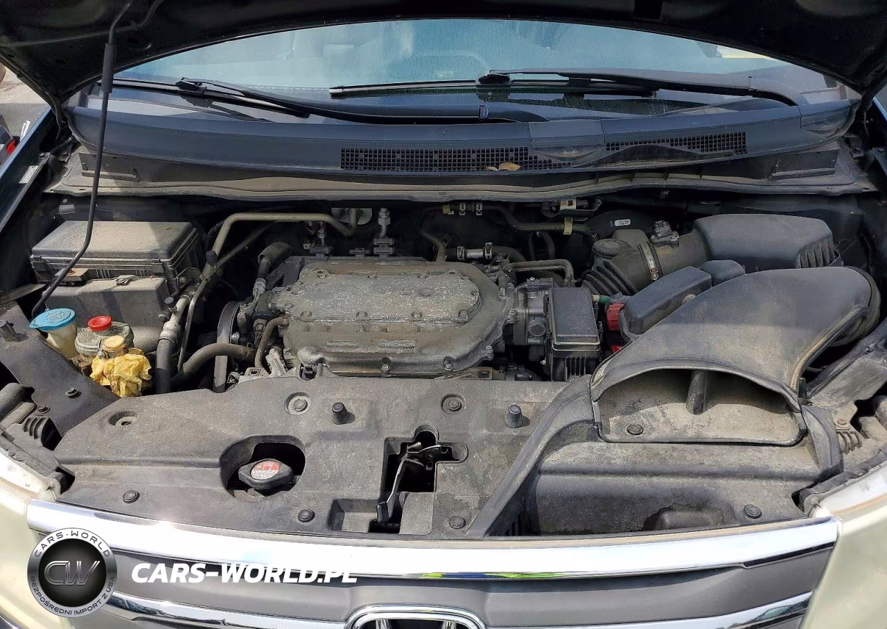 2012 Honda Odyssey Touring VIN:5FNRL5H98CB132086 - 12