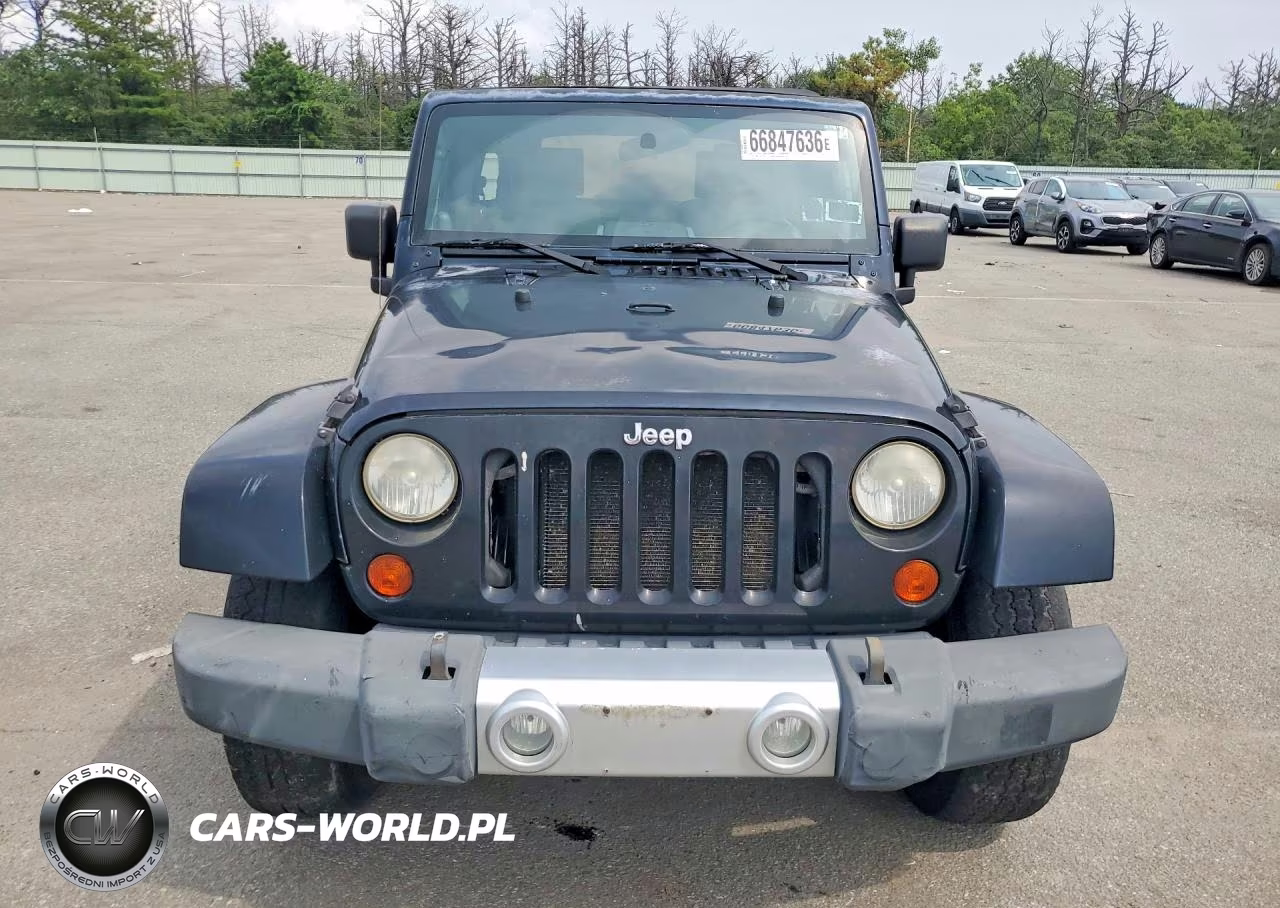 2008 Jeep Wrangler Unlimited Sahara VIN:1J8GA591X8L576086 - 5