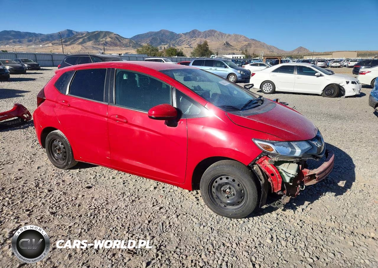2015 Honda Fit Lx VIN:3HGGK5H54FM737067 - 4
