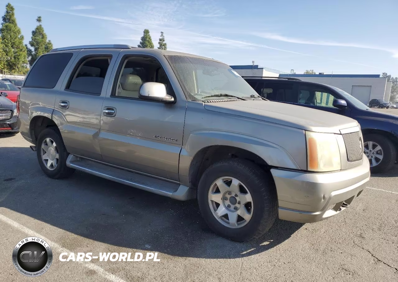 2002 Cadillac Escalade Luxury VIN:1GYEK63NX2R243057 - 4
