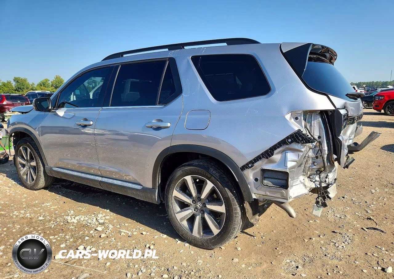 2023 Honda Pilot Touring VIN:5FNYG2H75PB009767 - 2