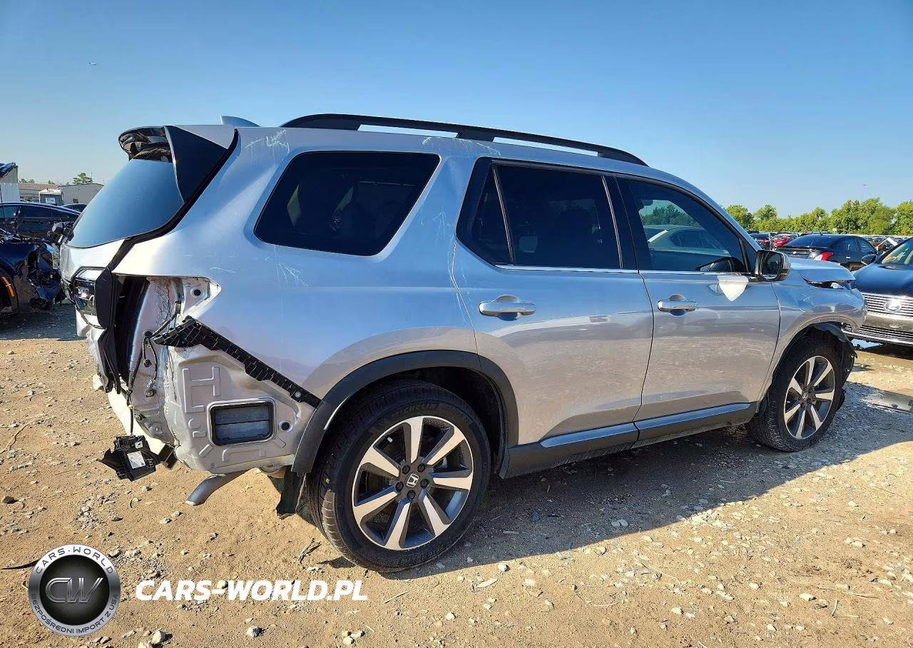 2023 Honda Pilot Touring VIN:5FNYG2H75PB009767 - 3