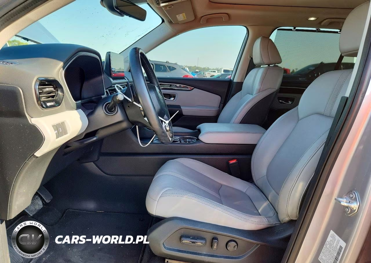 2023 Honda Pilot Touring VIN:5FNYG2H75PB009767 - 7